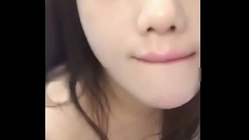 Young Asian Beauty’s Sensual Oral Performance
