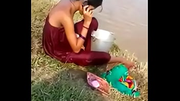 Desi Bhabhi Bathing In An Open Space, Her Wet Body Glistening Under The Sun, Inviting Lustful Gazes