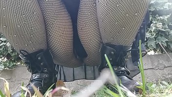 She’s Desperate To Let It Flow In The Park, Bending Over To Flash Her Slick Cunt Through The Fishnets Just For You.