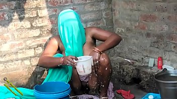 Desi Radhika’s Raw Village Bath: Hindi Wetness Unleashed