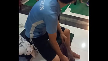 Bare And Brazen, A Chinese Man Flaunts His Physique At A Phnom Penh Fitness Center.