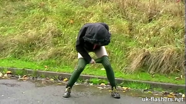 Exposed And Shameless, She Pleasures Herself While Relieving Her Bladder In Full View Of The Public.
