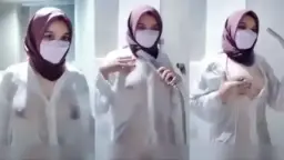 Drenched Camilla In Wet Hijab Attire