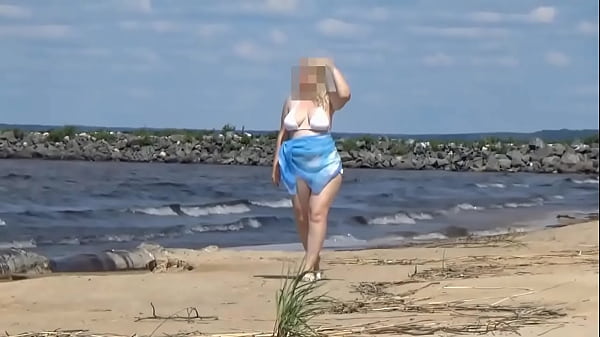 Sultry Beach Goddess In A Dazzling White Bikini