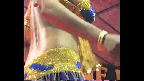 Indian Stripper Bares It All, Hips Grinding Slow, Sweat Glistening On Brown Skin, Eyes Promising Forbidden Pleasure.